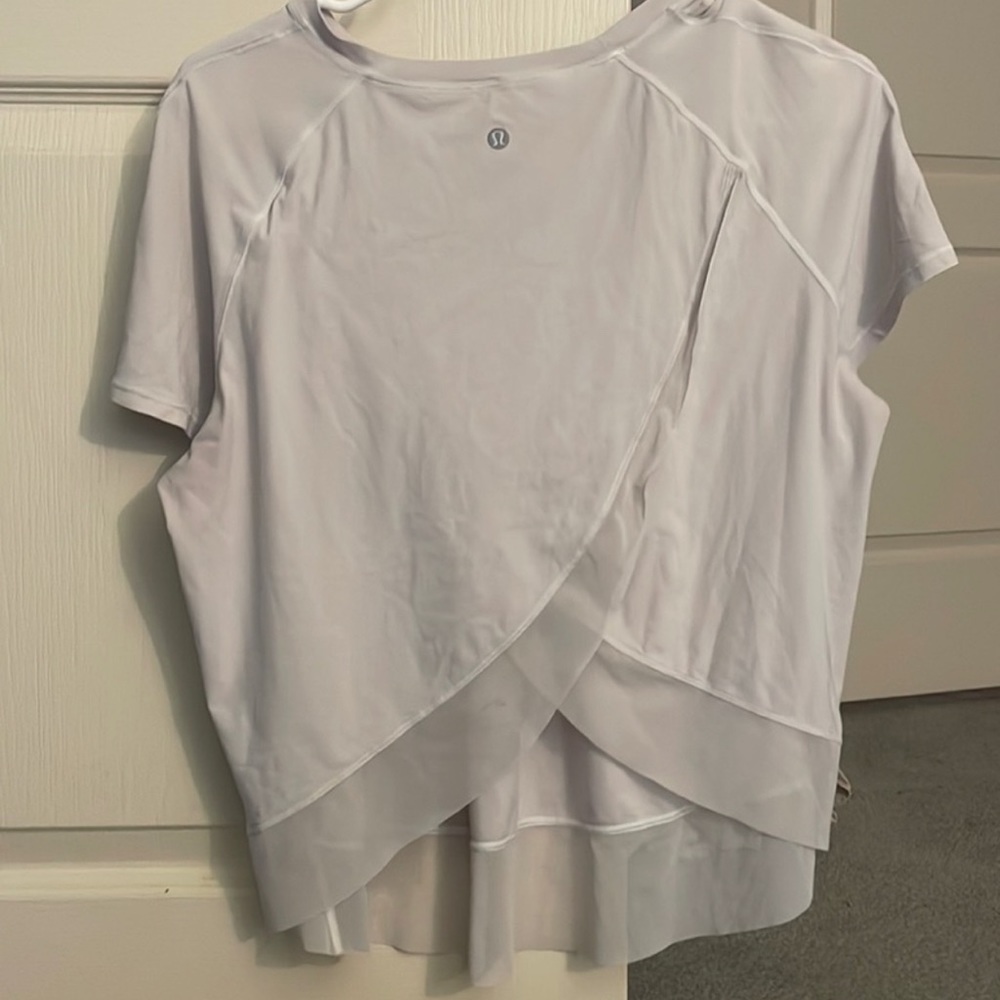 Lululemon Quick pace top open back, size 10 in grey ish white. NOT IN PINK!